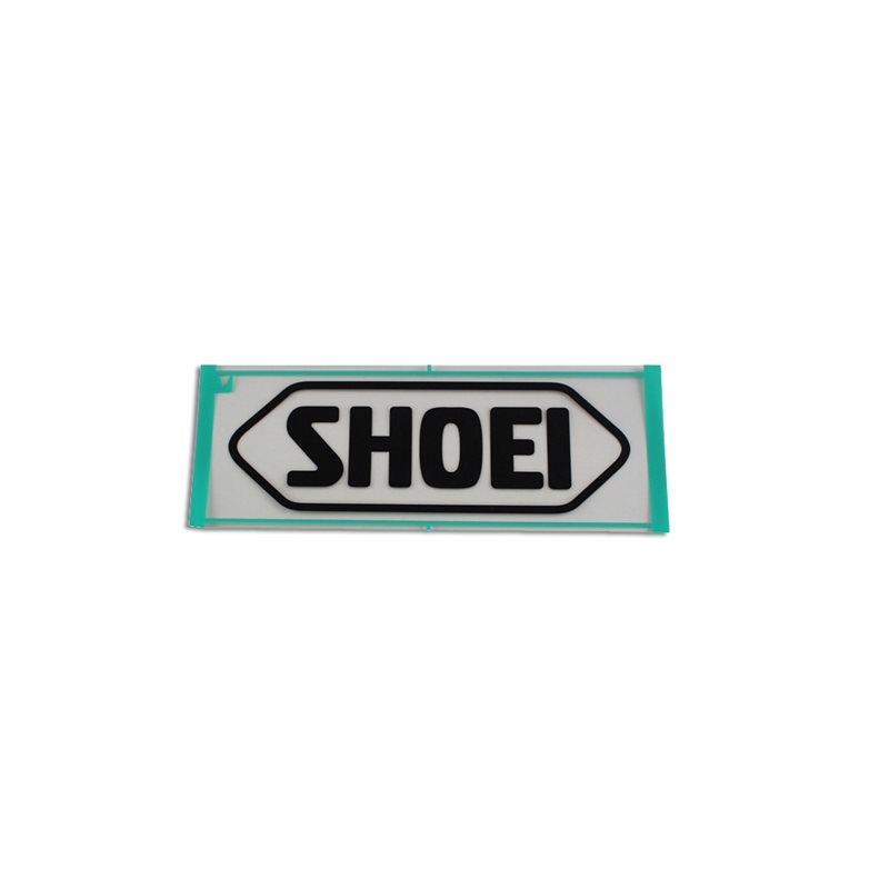 RECAMBIO SHOEI LOGO FRONTAL 82MM RJ PLATINUM-R / S-20 NEGRO MATE