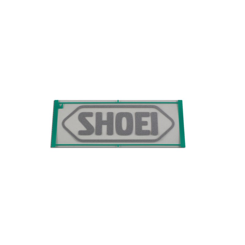RECAMBIO SHOEI LOGO FRONTAL 82MM RJ PLATINUM-R / S-20 PLATA MATE